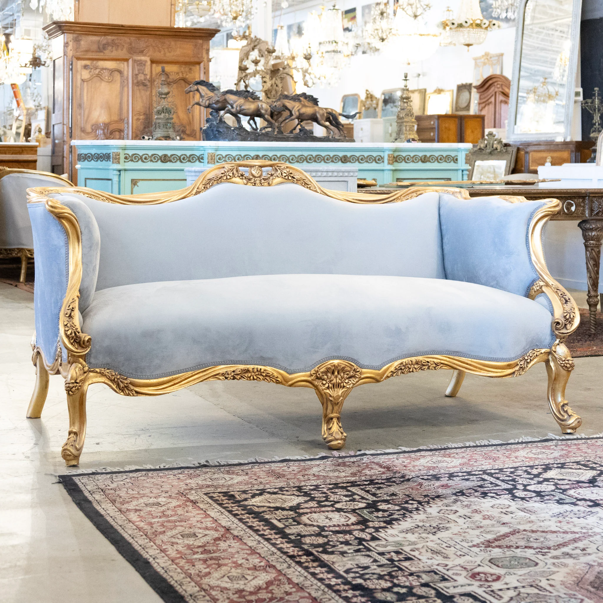 Louis XV Sofa – Gilded Frame & Floral Carvings with Muted Blue Velvet Upholstery