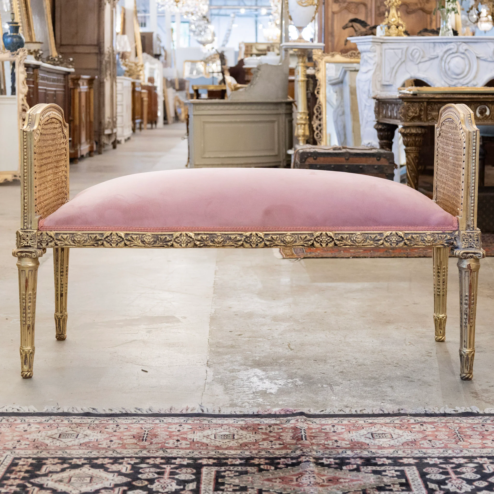 Louis XVI Gilded Cane Bench – Pink Velvet Upholstery & Floral Carvings