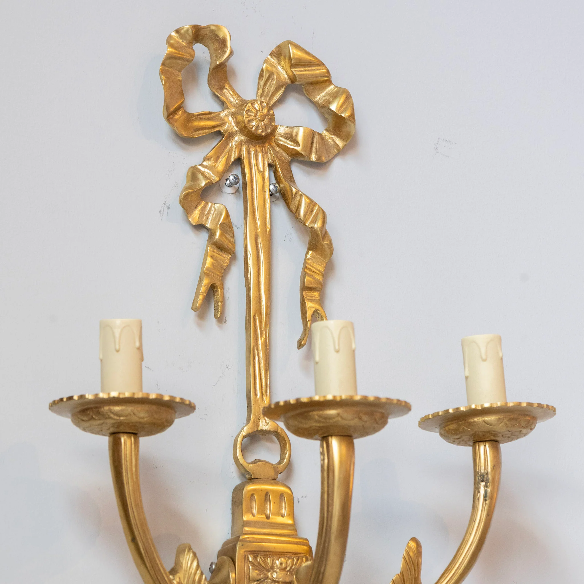 Pair of Louis XVI Grand Gilded Wall Sconces – Bright Gold with Bow Frame - Image 3
