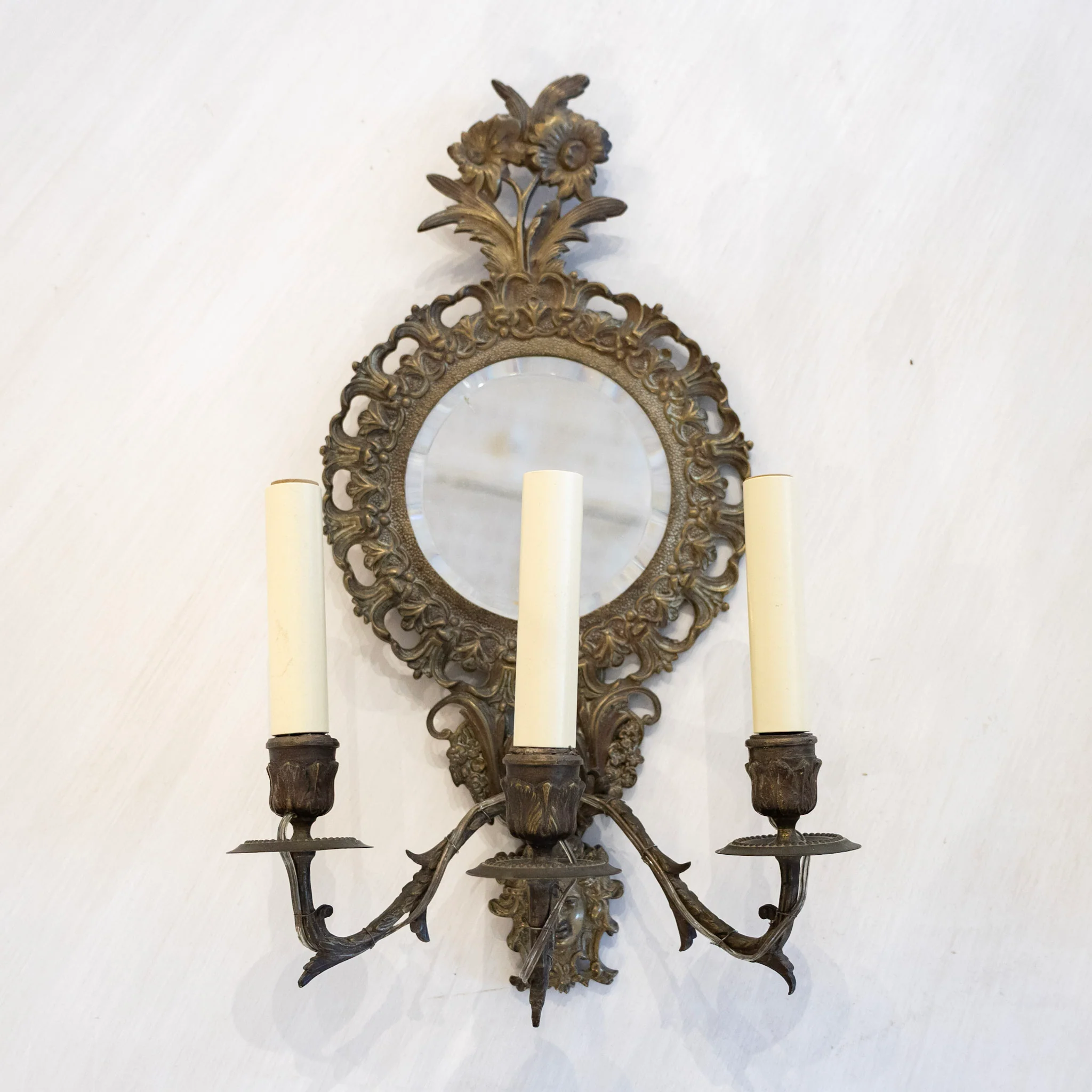 Pair of French Brass Round Mirror Wall Sconces - Floral Crest & Empire Frame