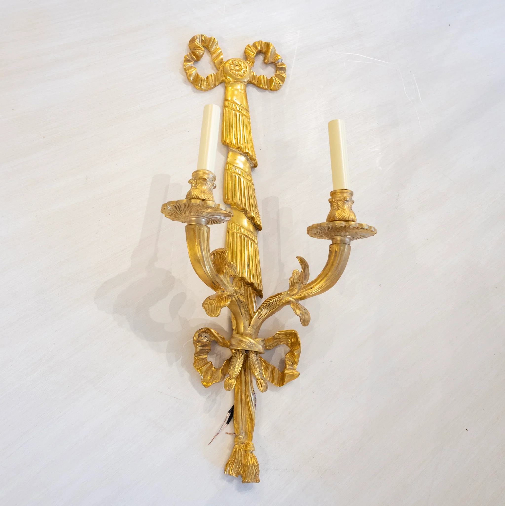 Pair of French Large Brass Wall Sconces - Bow Crest & Fluted Leaf Frame