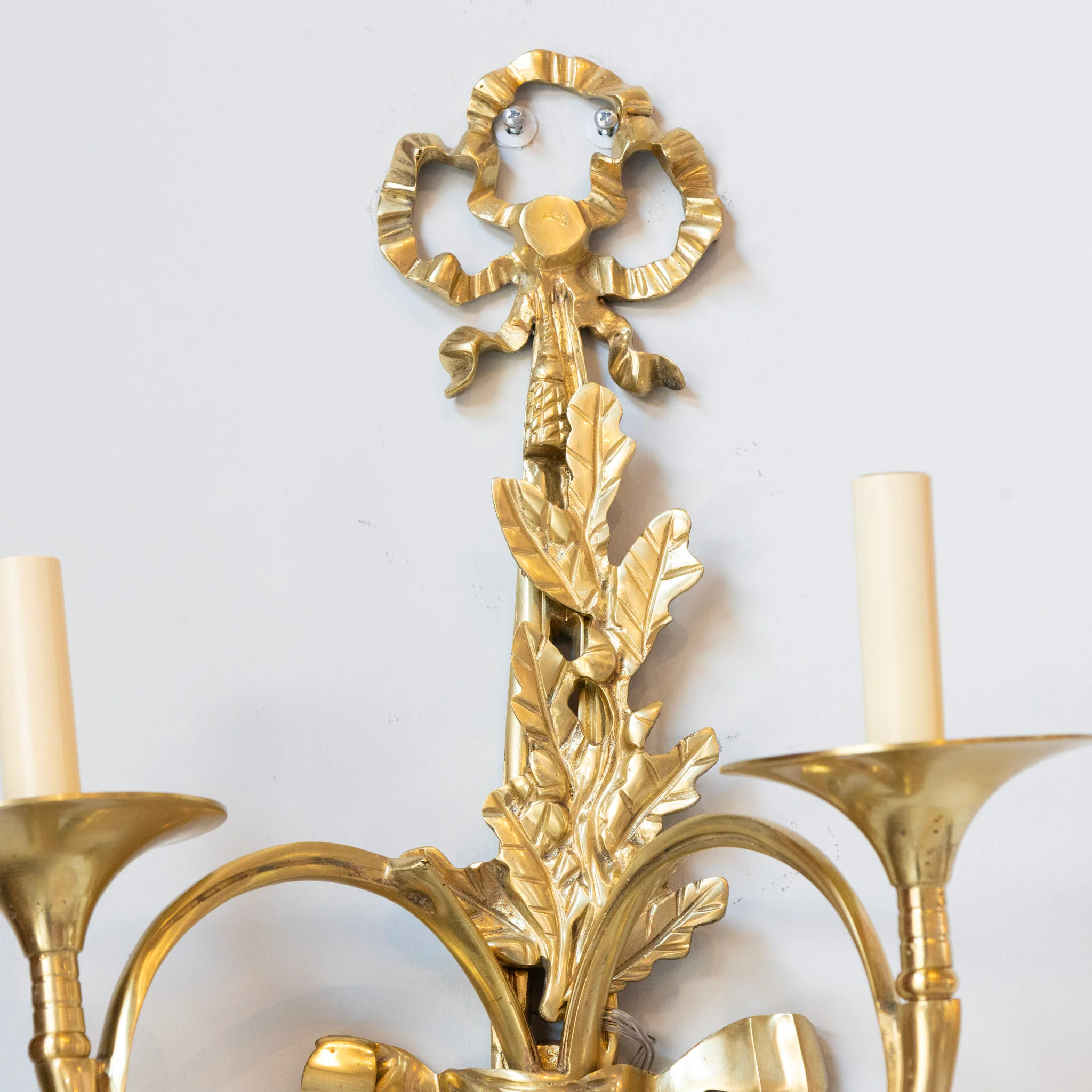 Pair of Louis XVI Brass Sconces – Bow Frame & Laurel Detailing - Image 4